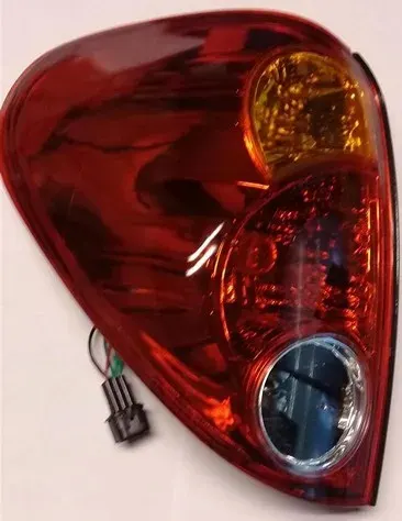 FAROL TRA IZQ MITSUBISHI L200 06
