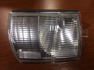 FAROL DEL IZQ MITSUBISHI CANTER 06 (LAT) DEPO
