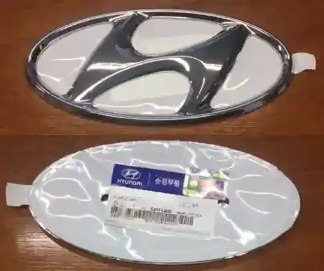 EMBLEMA CARETA-PORTON HYUNDAI H1 08 (H) ORIGINAL