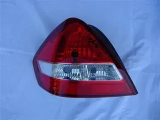 FAROL TRA IZQ NISSAN TIIDA 07 (SEDAN) DEPO