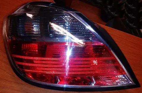 FAROL TRA IZQ GM VECTRA 09 GTX