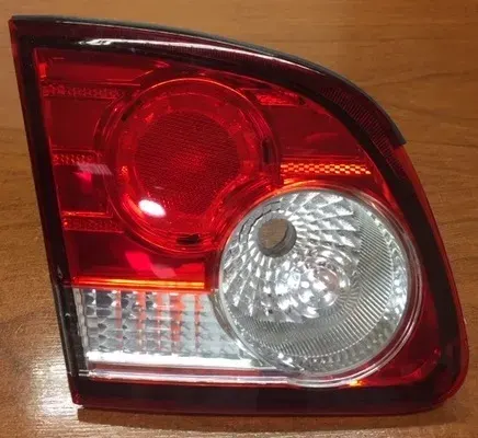 FAROL VALIJA IZQ GM CORSA 11 SEDAN CIRCULO BLANCO