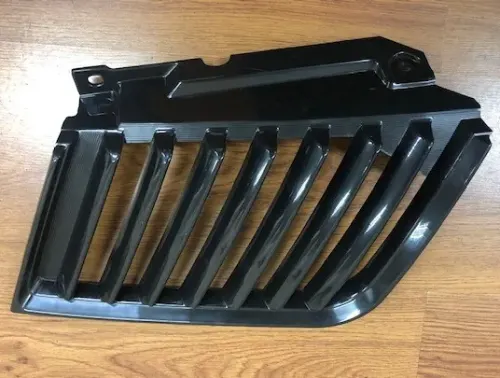 CARETA DER MITSUBISHI L200 06 NEGRA