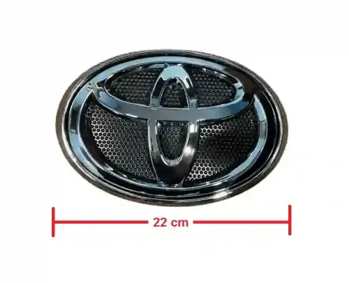 EMBLEMA CARETA TOYOTA HILUX 16